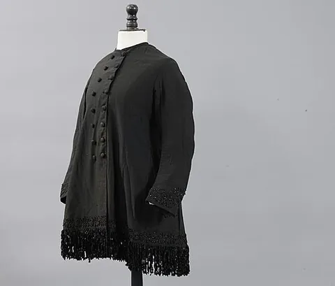 paletot: a loose outer jacket, cloak, coat, overcoat, greatcoat, three-quarter coat
