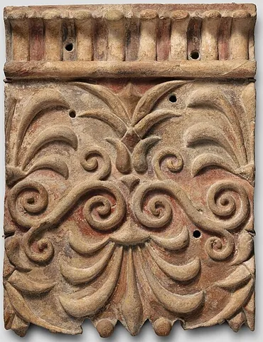 palmette: a motif in decorative art resembling the fan-shaped leaves of a palm tree