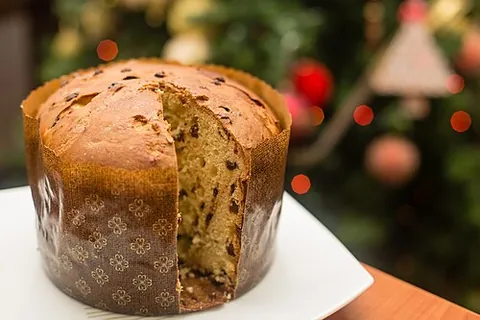 panettone: a soft Italian sourdough brioche from Milan, with candied fruit, usually prepared for Christmas as...
