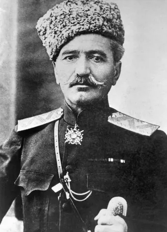 papakha: a fur or sometimes wool hat traditionally worn by men throughout the Caucasus and Central Asia; its...