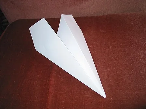 paper airplane: a toy airplane made by folding up a sheet of paper