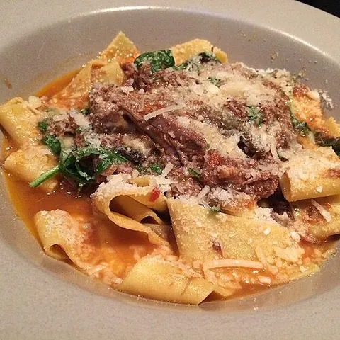 pappardelle: a broad form of fettuccine, or a narrow form of lasagne, traditionally eaten with a meat sauce...