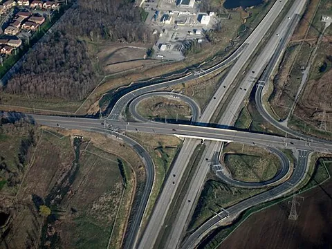 partial cloverleaf interchange: a variation on the cloverleaf interchange in which there are fewer loop ramps