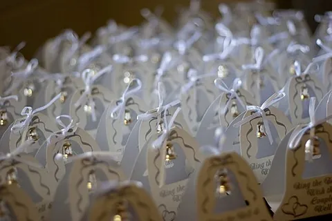 party favor: a small gift given to a guest at a party, as a souvenir