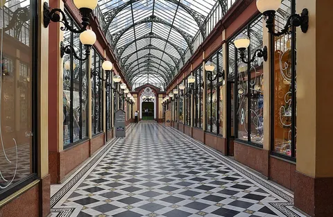 passageway: a covered walkway, between rooms or buildings