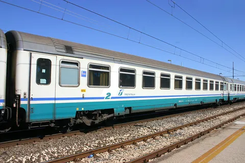 passenger car: a railroad car designed to carry passengers