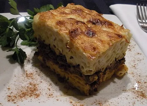 pastichio: a Greek dish made with cheese, chopped meat and pasta, resembling lasagna