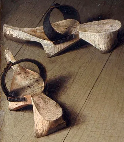 patten: any of various types of footwear with thick soles, often used to elevate the foot, especially...
