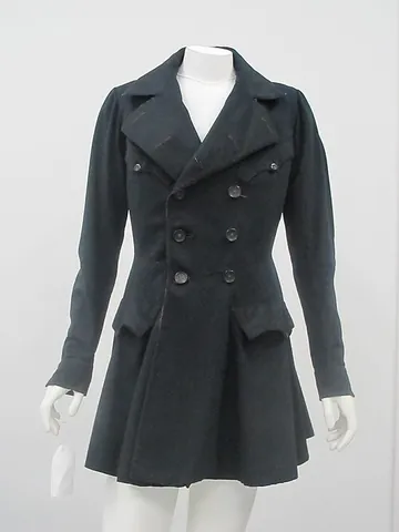 pea coat: a coat of heavy, navy-coloured wool, originally worn by sailors of European navies