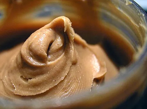 peanut butter: a spread made from ground peanuts