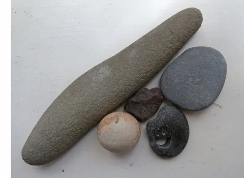 pebble: a small stone, especially one rounded by the action of water