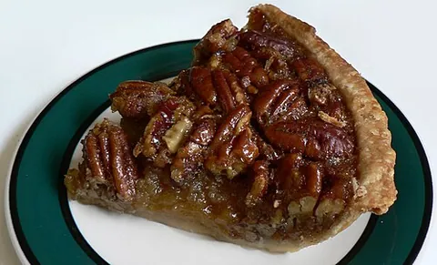 pecan pie: a sweet pie made from corn syrup and pecans, considered a specialty of Southern United States...