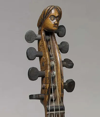 peghead: the part of a stringed instrument, at the end of the neck, that holds the pegs or mechanical tuners...