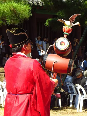 pellet drum: a drum (membranophone) that has two heads and produces sound through two pellets, tied to the body...