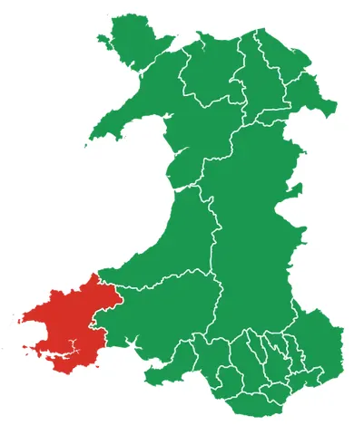 pembrokeshire: a maritime traditional county of Wales, bordered by Carmarthenshire and Cardiganshire