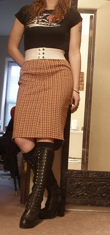 pencil skirt: a slim skirt (clothing) with a straight and narrow cut, usually approximately knee-length