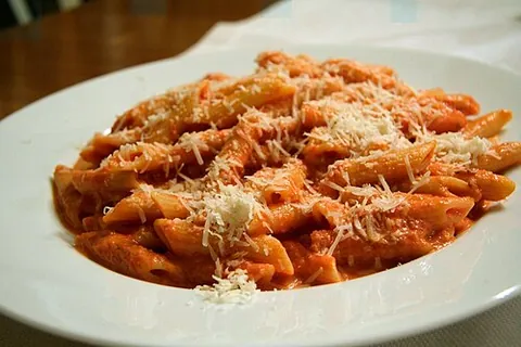 penne alla vodka: a pasta dish made primarily with vodka and penne, usually accompanied with heavy cream, crushed...