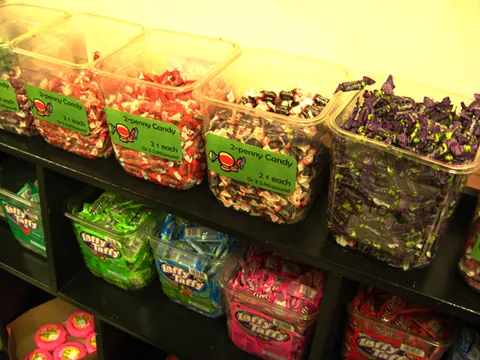 penny candy: candy, historically sold by the piece at one penny each, now usually sold in bulk by weight