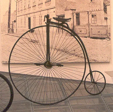 penny farthing: a type of bicycle popular in the 19th century, with the front wheel far larger than the rear one