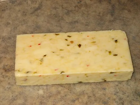 pepper jack: a cheese derived from Monterey Jack with the addition of spicy hot peppers