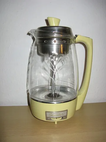 percolator: a device used to brew coffee by passing boiling water through coffee grounds