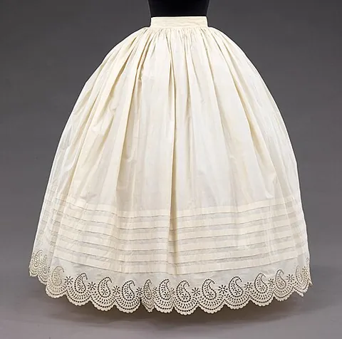 petticoat: a tight, usually padded undercoat worn by women over a shirt and under the doublet