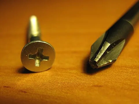 phillips head: a screwdriver with a '+' shaped head for turning screws so socketed