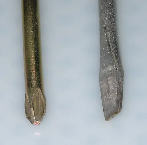 phillips screwdriver: a screwdriver having a cross-shaped tip