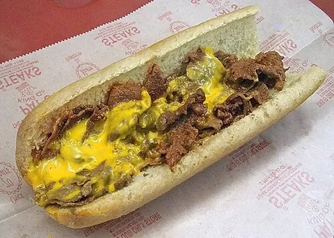philly cheesesteak: a cheesesteak sandwich made according to the classic Philadelphia recipe of melted cheese, sliced...