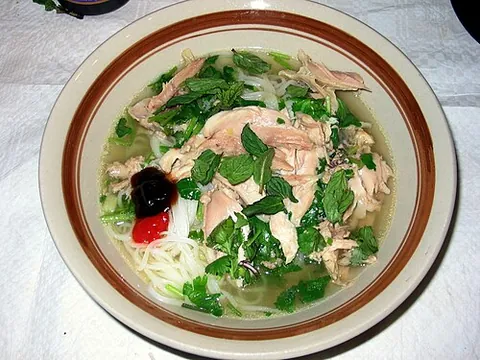 pho: a Vietnamese soup with a beef base, typically served with rice noodles and optionally beef or...