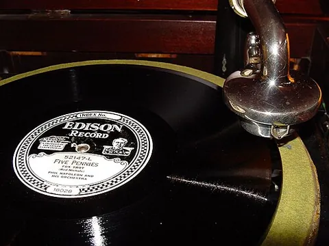 phonograph record: a disc, usually made of a polymer, used to record sound for playback on a phonograph