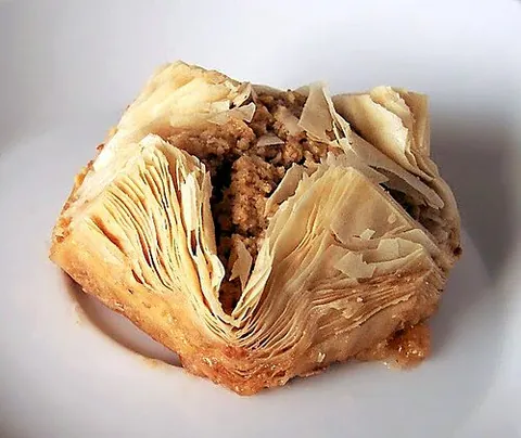 phyllo: a type of dough, originating in Mediterranean cuisine, that is used in thin layers to make pastries...