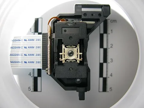 pickup lens: the laser lens used in an optical drive, such as a CD or DVD player