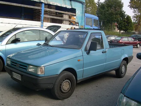 pickup truck: a light truck with an open cargo bed