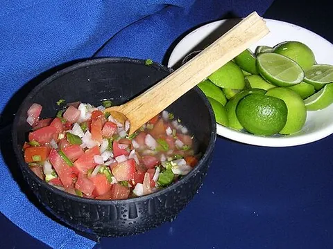 pico de gallo: a condiment generally made with diced raw onions, tomatoes, chiles, and cilantro