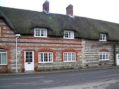 piddletrenthide: a village and civil parish (served by Piddle Valley Parish Council (Group)) in Dorset, England,...