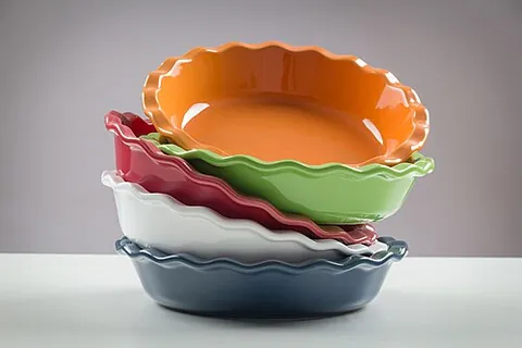 pie plate: a small dish in which pies are baked