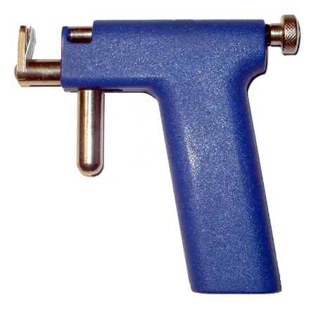 piercing gun: a device designed to pierce earlobes by driving a pointed starter earring through the lobe