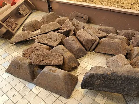 pig iron: a brittle, impure form of iron produced by smelting iron ore which is often shaped into blocks; it...