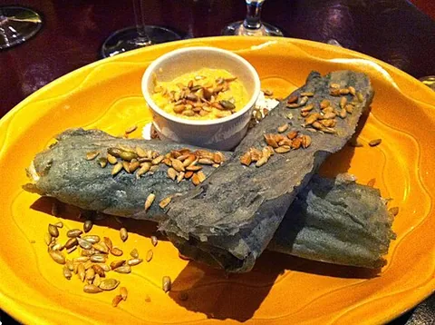 piki: a paper-thin, dry, rolled bread made by the Hopi with nixtamalized blue corn meal