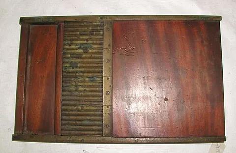 pill press: an implement designed to facilitate the manufacture of pills from medicament mass