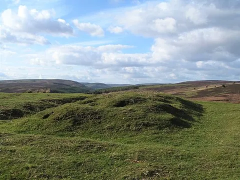 pillow mound: synonym of rabbit warren; an artificial, long and low earth heap built from the 11th century onward...