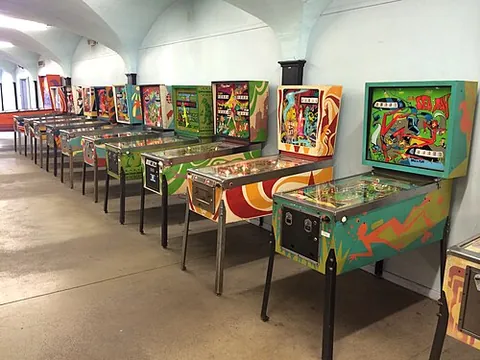 pinball: a game, played on a device with a sloping base (a pinball machine), in which the player operates a...