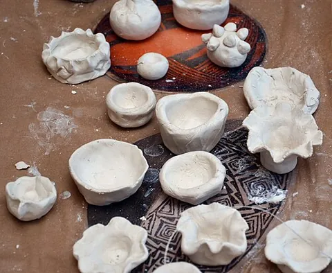 pinch pot: a ceramic pot created by pinching the clay into the desired shape
