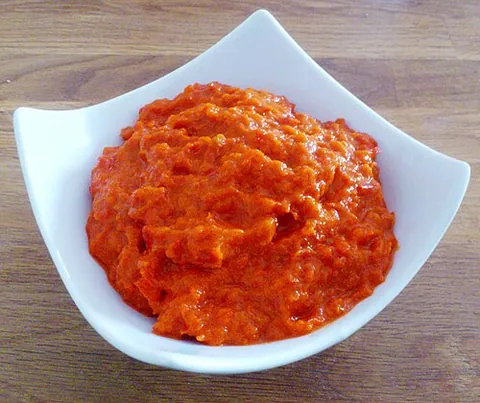 pindjur: a spicy relish resembling ajvar, commonly used as a summer spread in Bosnia, Bulgaria, Serbia and...