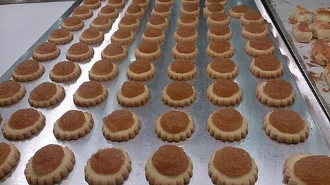 pineapple tart: a bite-sized buttery, crumbly pastry filled with pineapple jam and served during festivities in...