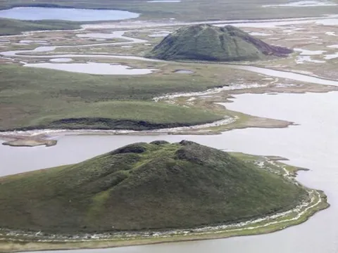pingo: a conical mound of earth with an ice core caused by permafrost uplift, particularly if lasting more...