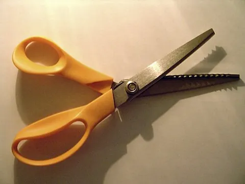 pinking shears: a pair of scissors with zigzag cutting edges, used to cut fabric: the zigzag edge helps keep the...