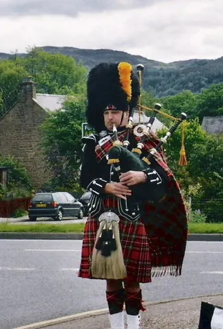 piper: a musician who plays a pipe