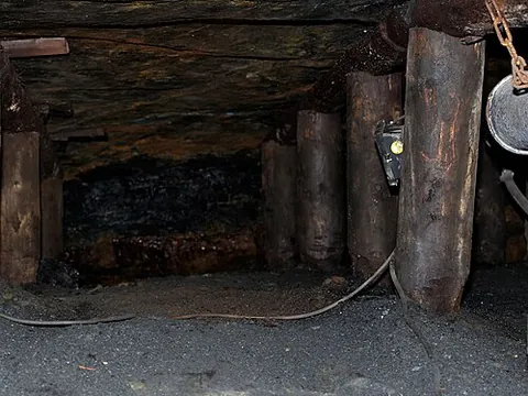pit prop: a wooden beam used as a support within a mineshaft or tunnel